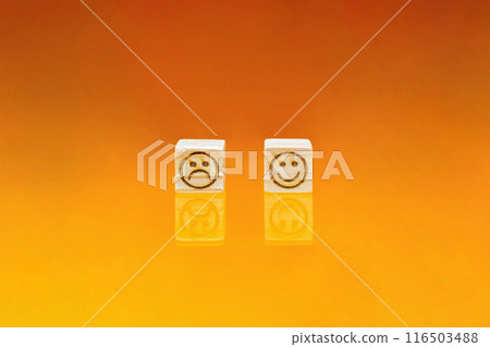 Blocks of dissatisfied and satisfied marks on a reflective orange background 116503488