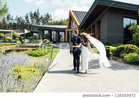 Cute bride couple spend time together after the wedding ceremony Cute bride couple spend time together after the wedding ceremony 116503972