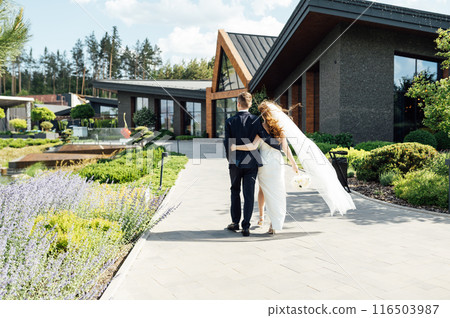 Cute bride couple spend time together after the wedding ceremony 116503987