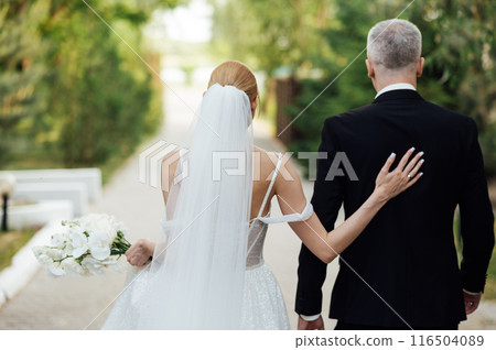 Cute bride couple spend time together after the wedding ceremony 116504089