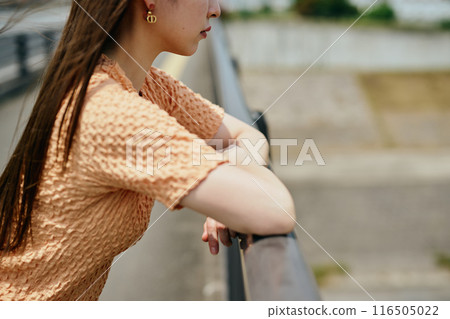 Young woman looking at the view Young woman looking at the view 116505022