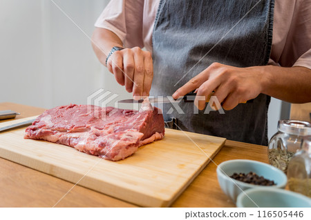 Raw fillet beef meat for steaks on the home electric grill 116505446