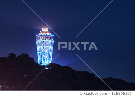 Illuminated Sea Candle at night 116506195