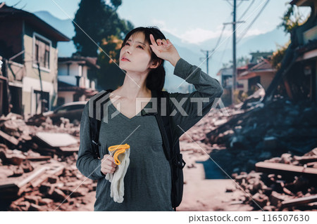 Young woman affected by disaster Young woman affected by disaster 116507630