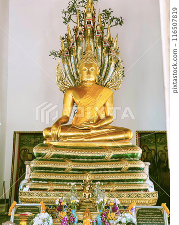 Golden Buddha Statue With Seven Heads Naga At Wat Pho Buddhist Temple In Bangkok, Thailand. 116507819