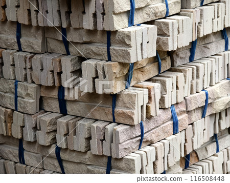 Brick stack tied with ropes for construction and building purposes Brick stack tied with ropes for construction and building purposes 116508448