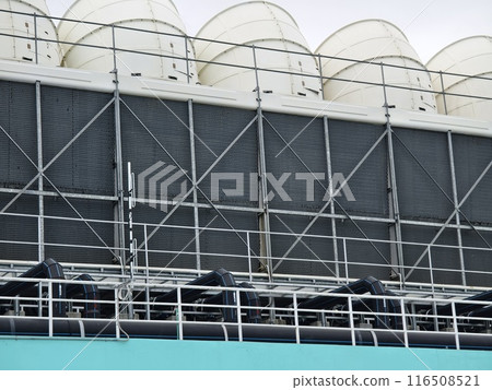 Ventilation pipes on the top of large industrial building 116508521