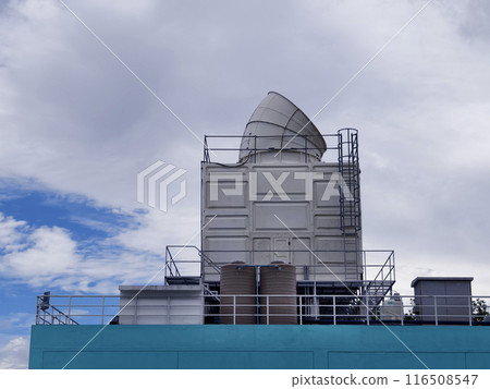 Ventilation pipes on the top of large industrial building 116508547