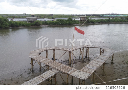 Love bridge and indonesian flag on beach mangrove background 116508626