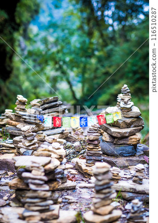 Buddhist Mantra on multicolored flags in himalayas on Annapurna 116510287