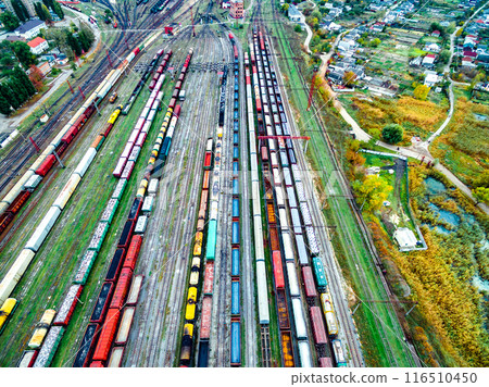 aerial shoot of railway tracks with lots of wagons aerial shoot of railway tracks with lots of wagons 116510450