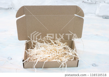 cardboard box on a table 116510518