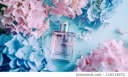 Perfume bottle with beautiful flowers. Floral background. Beauty concept. Flat lay, top view. 116514072
