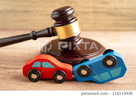 Hammer gavel judge with car vehicle accident, insurance coverage claim lawsuit court case. 116519490
