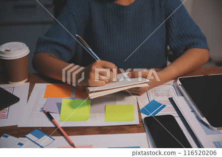 The designer team is designing the uxui system to make the uxui system work well on new phones and support system updates. Website development concept UI UX front end designer The designer team is designing the uxui system to make the uxui system work well on new phones and support system updates. Website development concept UI UX front end designer 116520206