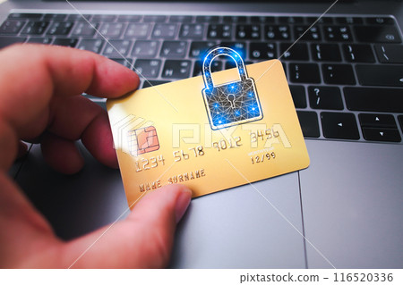 Human hand holding credit or debit card with padlock, protection of financial transactions 116520336
