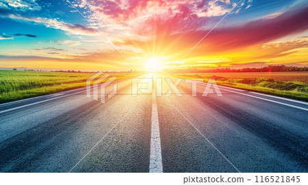 An empty highway at sunset with a dramatic sky full of sunlight ray 116521845