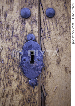 Detail of old and rusty medieval lock, security Detail of old and rusty medieval lock, security 116522928