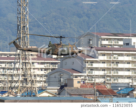 A UH-1J utility helicopter flying over Yao Garrison. 116523055