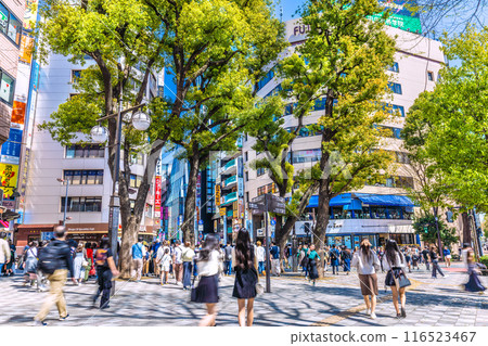 Tokyo cityscape in Japan. In front of Ikebukuro Station. View of the downtown area including SUNSHINE60ST (back of the screen) on the 31st Tokyo cityscape in Japan. In front of Ikebukuro Station. View of the downtown area including SUNSHINE60ST (back of the screen) on the 31st 116523467