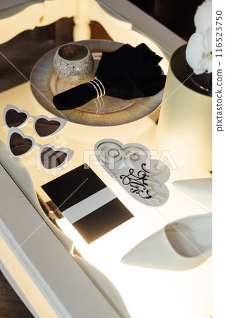 Wedding invitations. Wedding details of the bride. Bridal bouquet and other accessories. Shoes of the bride 116523750