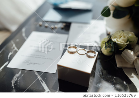 Wedding invitations. Wedding details of the bride. Bridal bouquet and other accessories. Shoes of the bride Wedding invitations. Wedding details of the bride. Bridal bouquet and other accessories. Shoes of the bride 116523769