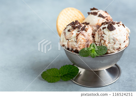 Chocolate and vanilla ice cream close-up. Chocolate and vanilla ice cream close-up. 116524251