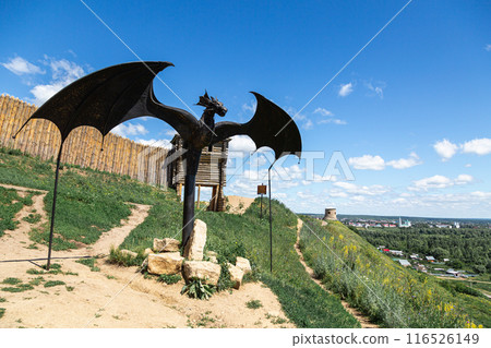 Yelabuga, Republic of Tatarstan, Russia, 28.06.2024: Panoramic view of the flood meadows of the Kama River from the Devil's hillfort and the monument to the Oracle Dragon 116526149