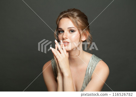 Woman female model with healthy skin, natural makeup and perfect updo hairstyle 116526782