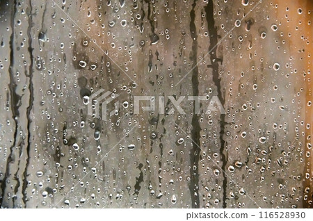 Background of water drops on glass in a shower room along with steam Background of water drops on glass in a shower room along with steam 116528930