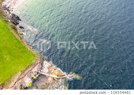 Aerial View of the pier at Muckros Head beach in Donegal, Ireland 116534481