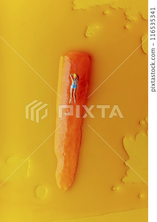 miniature woman in swimsuit on a freeze pop miniature woman in swimsuit on a freeze pop 116535341