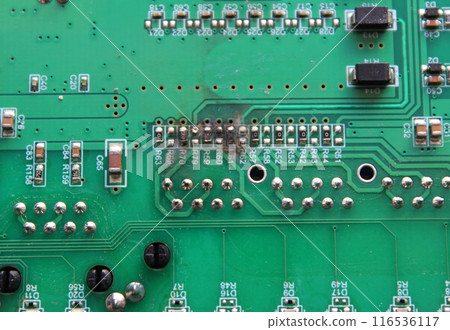 Electronic board with numbered burnt out silver pins texture background Electronic board with numbered burnt out silver pins texture background 116536117