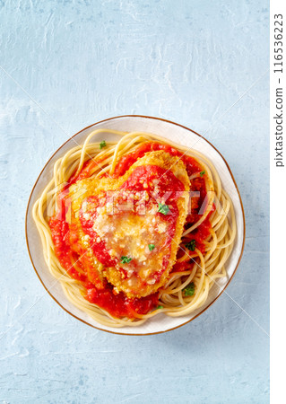 Chicken Parmesan, Italian pasta dish. Breaded chicken breast with cheese 116536223