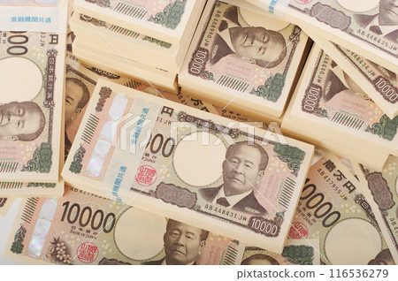 A large stack of 10,000 yen bills A large stack of 10,000 yen bills 116536279