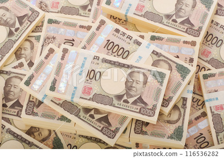 A large stack of 10,000 yen bills A large stack of 10,000 yen bills 116536282