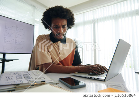 Marketer Working With Charts On Laptop Marketer Working With Charts On Laptop 116536864