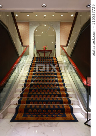 June 24 2024 dark Red carpet on the stairs in a luxury interior June 24 2024 dark Red carpet on the stairs in a luxury interior 116537729