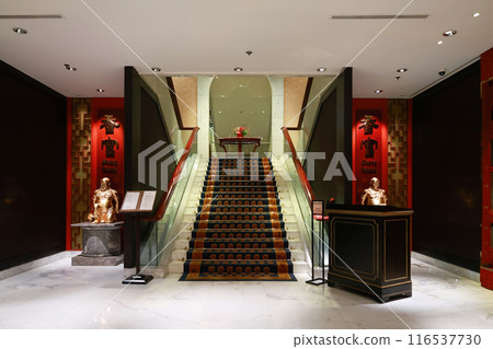 June 24 2024 dark Red carpet on the stairs in a luxury interior June 24 2024 dark Red carpet on the stairs in a luxury interior 116537730