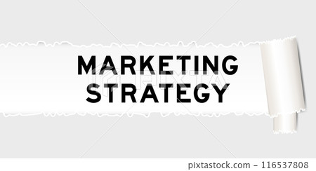 Ripped gray paper background that have word marketing strategy under torn part 116537808