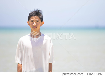 A beautiful tropical beach and a smiling man 116538492