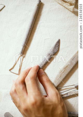 Close up Tools for forming clay on background 116538503