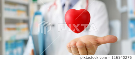 Doctor hand holding red plastic heart, save life Doctor hand holding red plastic heart, save life 116540276