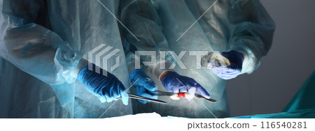 Operating tools and chest implants in surgery room Operating tools and chest implants in surgery room 116540281