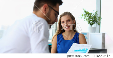 Colleagues discussing profitable of new startup, statistics data documents Colleagues discussing profitable of new startup, statistics data documents 116540416