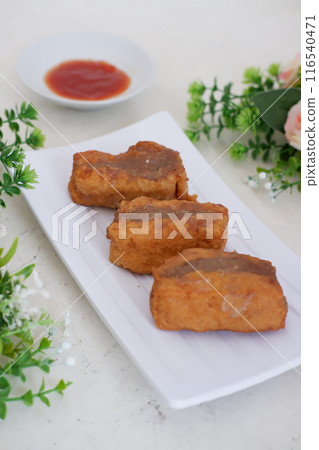 Spicy fried tofu filled with meat Spicy fried tofu filled with meat 116540471