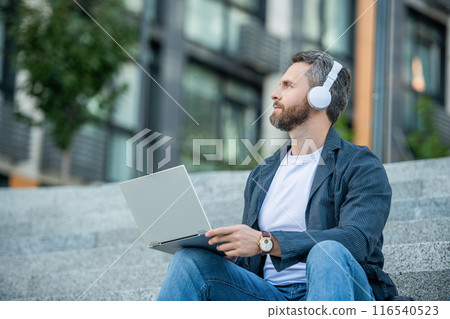 man webinar online sit outdoor. man webinar online in the street. man webinar online outside. man webinar online sit outdoor. man webinar online in the street. man webinar online outside. 116540523