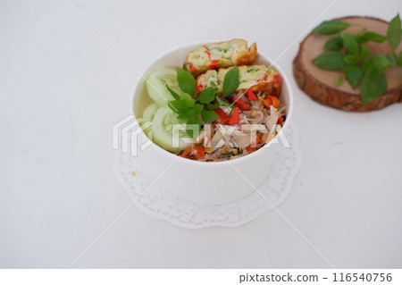 rice with scrambled eggs and vegetables in a cup 116540756