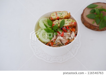 rice with scrambled eggs and vegetables in a cup 116540763
