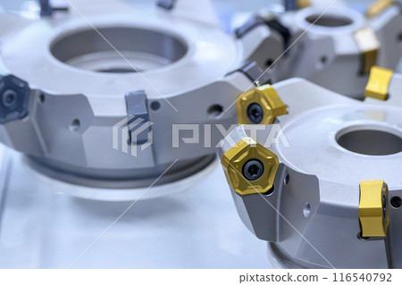 Close up scene the face milling tool for rough cutting process. Close up scene the face milling tool for rough cutting process. 116540792